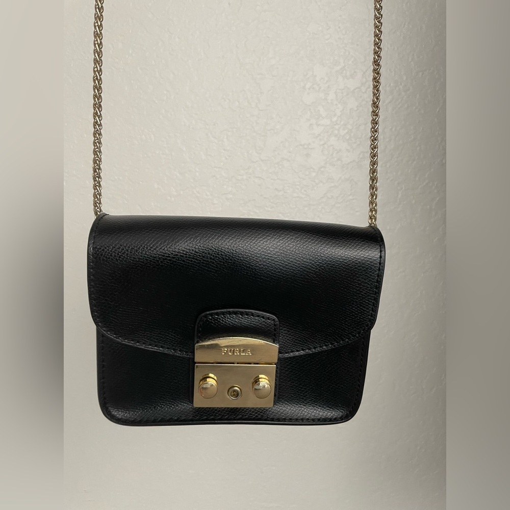 Furla Black Leather Mini Metropolis 
Crossbody Bag. Slight wear on gold hardware